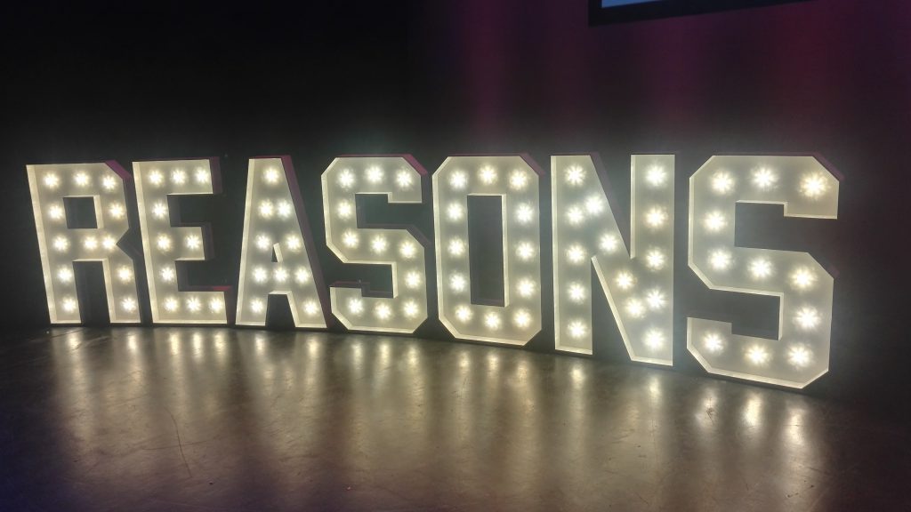 Reasons.to stage sign