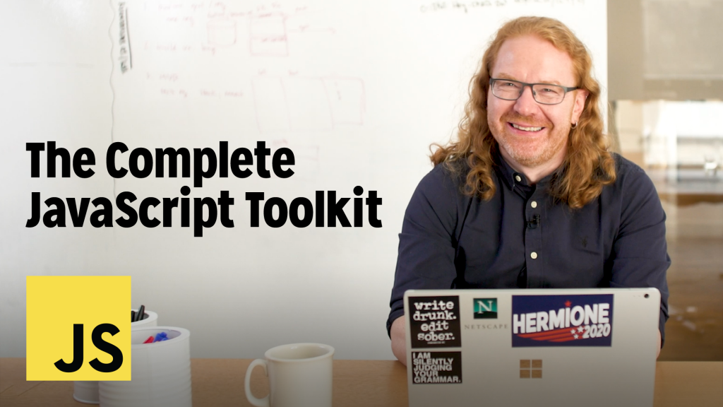Chris Heilmann smiling behind his laptop as the course is finished