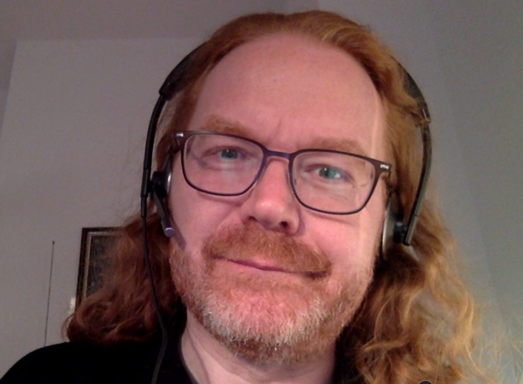 Chris wearing headset