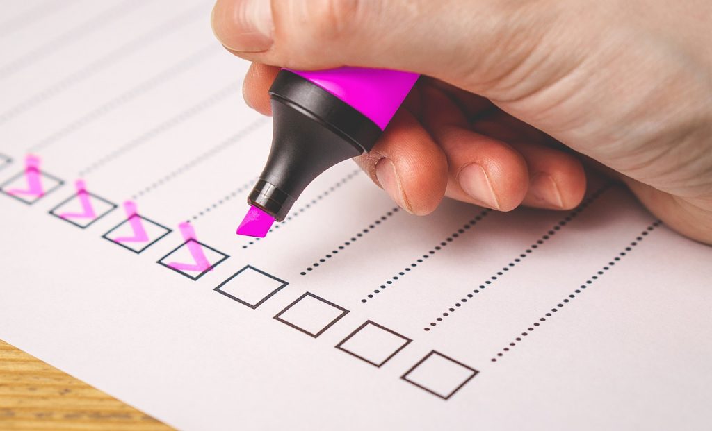 checking off a list with a marker