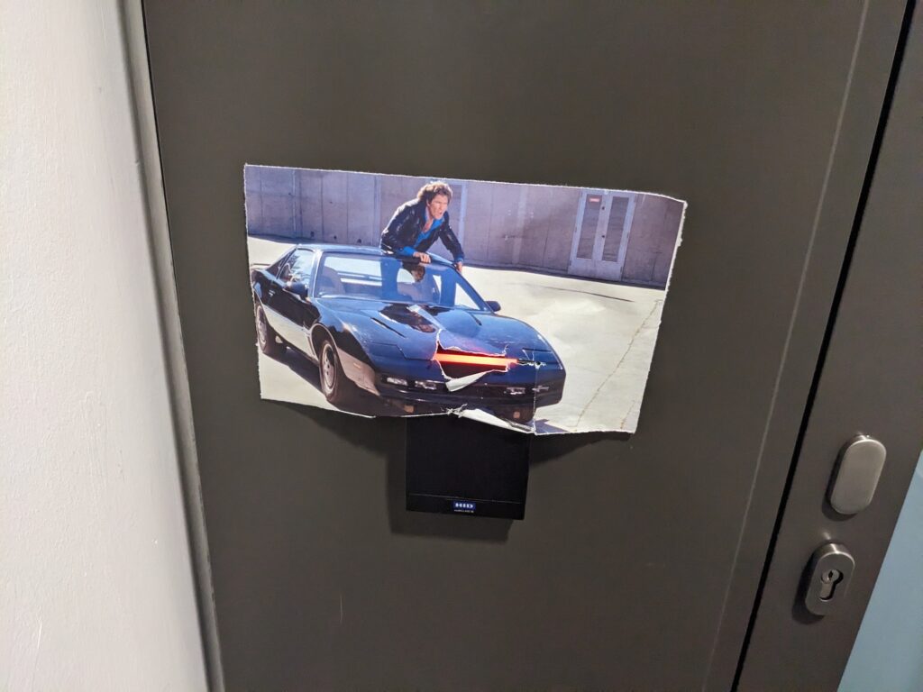 Office entry swipe bar with overlaid picture of Knight Rider
